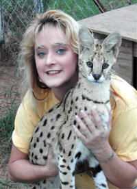 Tracy Wison with Rescued African Serval